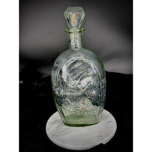 vintage glass bottle "historical flask" features an embossed profile of Lady Lib